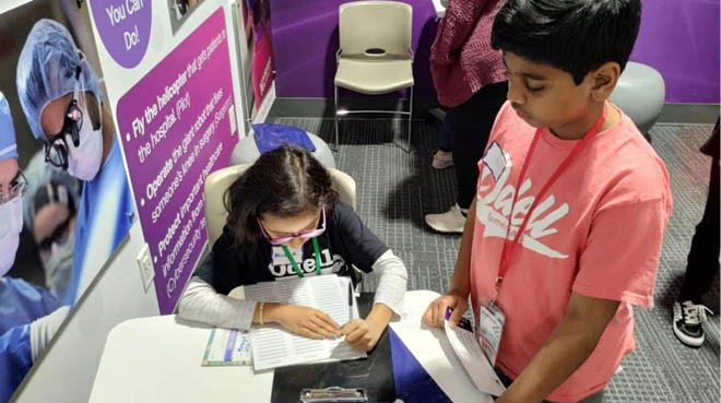 A woman and a boy are signing up for something at a table. AI generated content