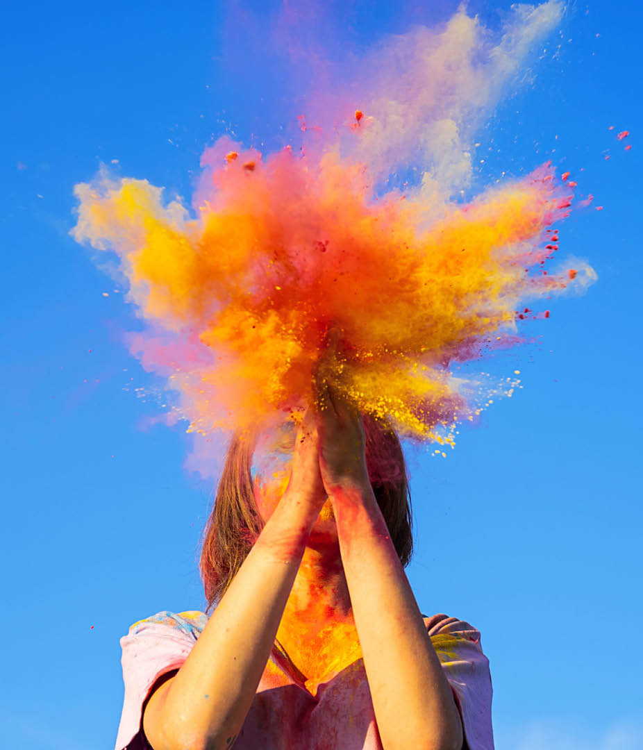 A person with their hands up in front of their face, with a background of a blue sky. AI generated content