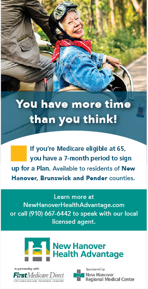 A woman is shown on a billboard for a healthcare company, smiling and wearing a helmet. The advertisement is for Medicare and is encouraging people to sign up. AI generated content