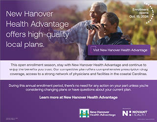 A man and woman are shown on a poster advertising health plans. AI generated content