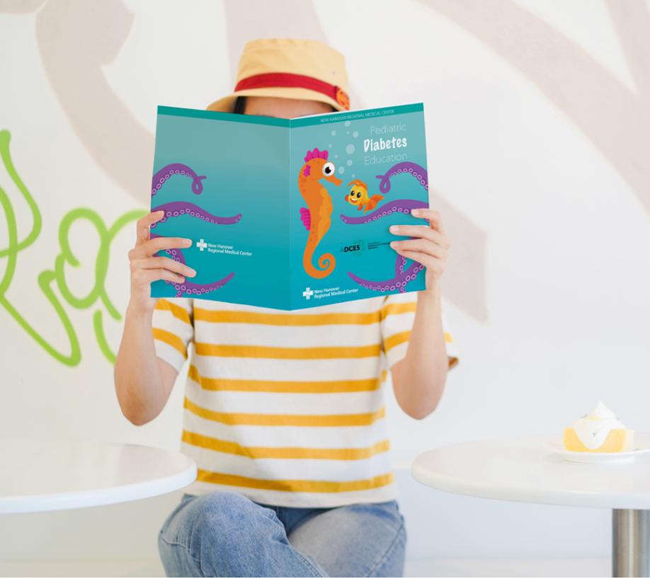 A person is sitting at a table with a book open in front of them. AI generated content