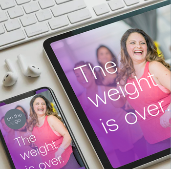 A woman is shown on a computer screen smiling and laughing. The image is accompanied by a cell phone and a keyboard. AI generated content