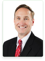 A man wearing a suit and tie is smiling for the camera. AI generated content