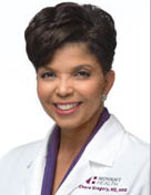 A woman wearing a white coat and purple shirt smiles for the camera. AI generated content
